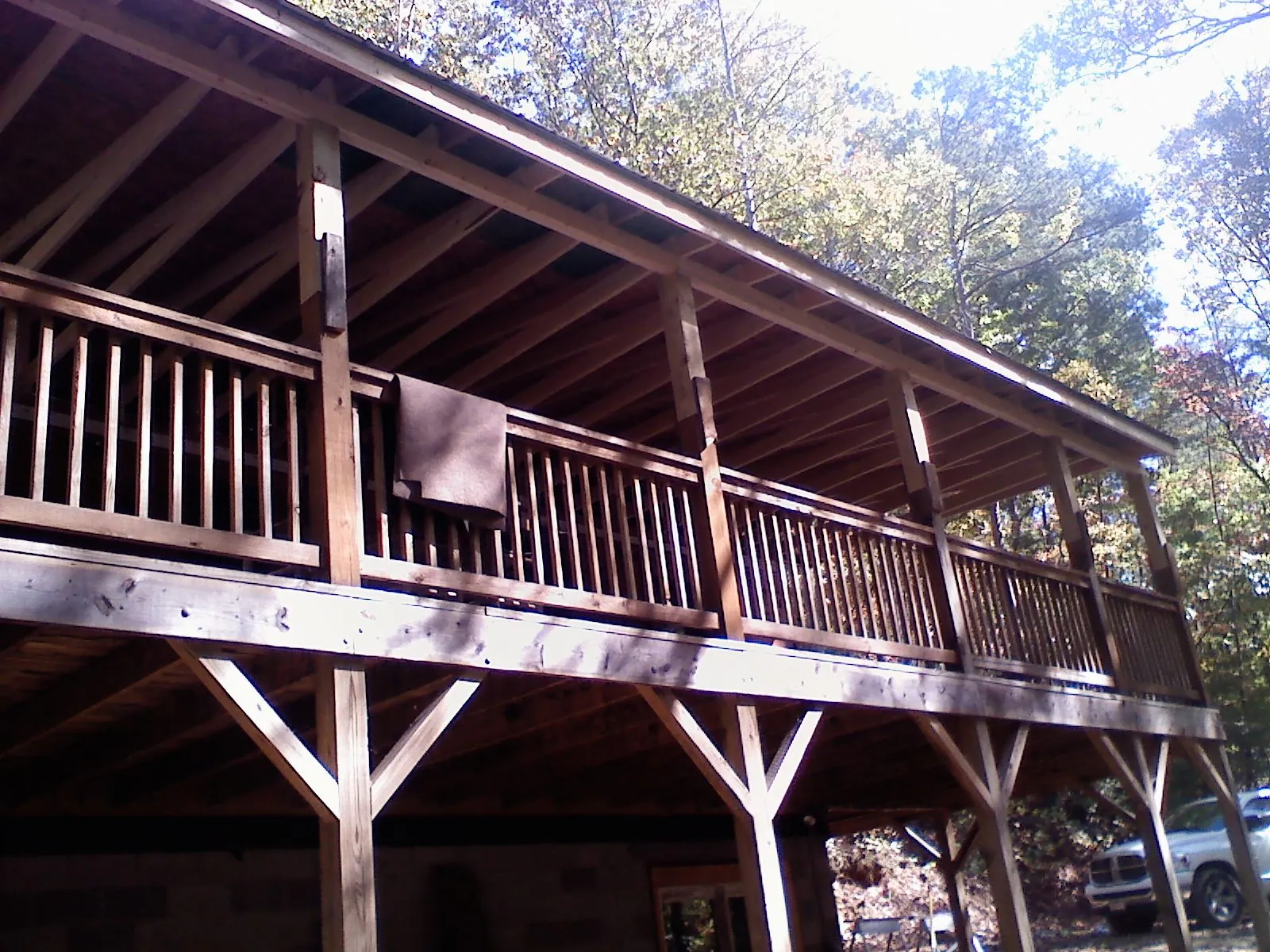 Timber framing under a new elevated porch and deck — Roof Leak Repair in Wenham by Roofing Brothers